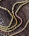 Sautoir perle or et coton
