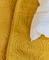 Détail du couvre-lit Kandi en coton et ouate matelassée
