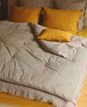 linge de lit : matelas vert et rose pour bout de lit