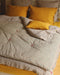 linge de lit : matelas vert et rose pour bout de lit