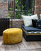 Petit pouf rond au design organique