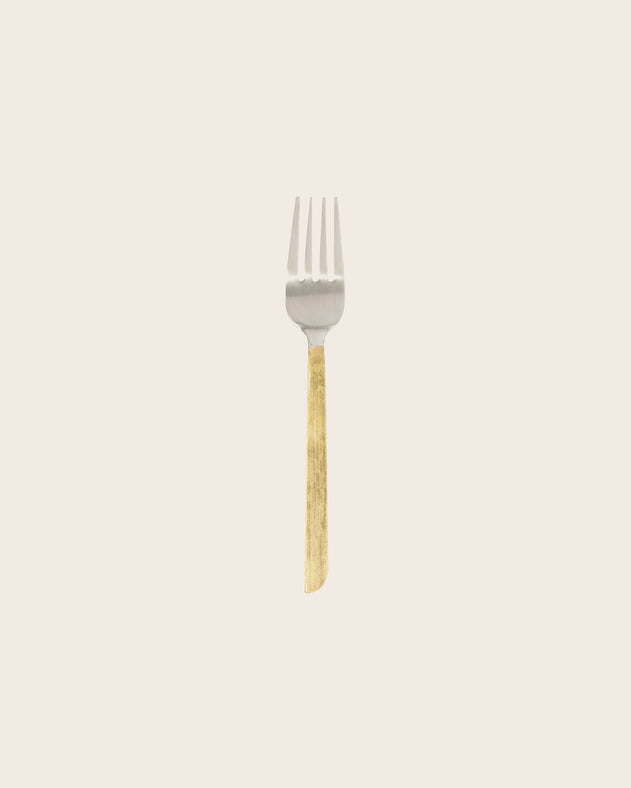 Fourchette en acier avec un manche doré