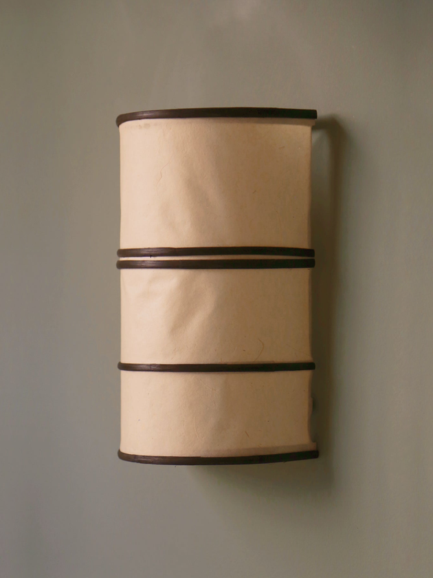 Applique en bambou de couleur noire à accrocher au mur