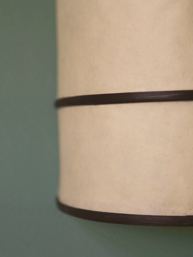 Applique en bambou de couleur noire à accrocher au mur