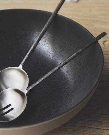 Couverts de service avec manche noir