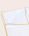 Literie : housse de couette en coton bio blanc avec une surpiqure jaune