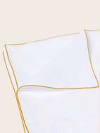 Literie : housse de couette en coton bio blanc avec une surpiqure jaune