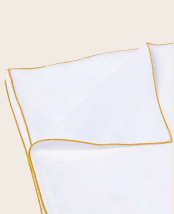 Literie : housse de couette en coton bio blanc avec une surpiqure jaune