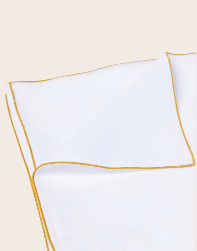 Literie : housse de couette en coton bio blanc avec une surpiqure jaune