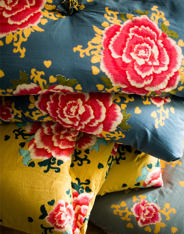 Linge de lit coloré à mettre en bout de lit