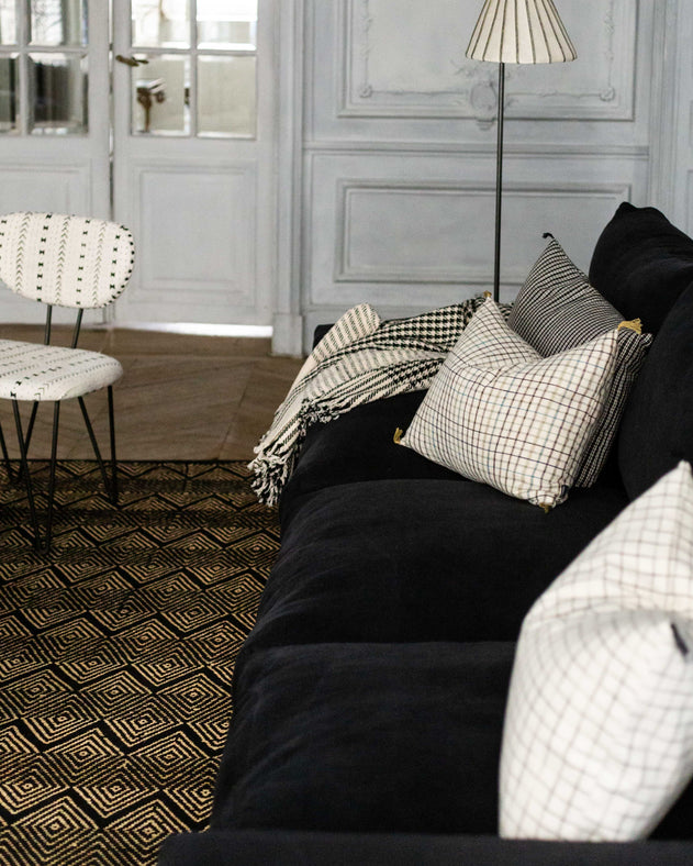 Housse de coussin en coton pour un salon noir et blanc