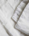 Zoom sur couette en soie