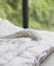 Couette en soie, enveloppe de sa chaleur en hiver