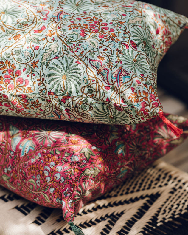 Housse de coussin imprimé framboise et turquoise
