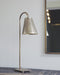Lampe à poser Ella bronze en acier nichée sur un pied altier