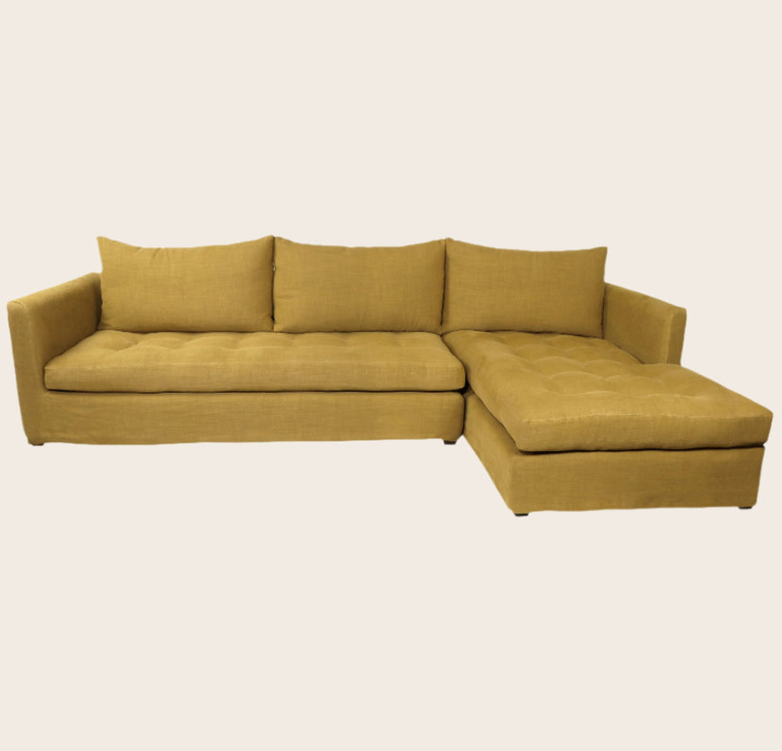 Grand canapé d'angle capitonné