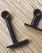 Accessoires noir en acier pour poser votre tringle à rideaux