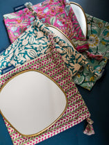 ensemble mini miroir Ame en laiton et ses pochons en tissu 