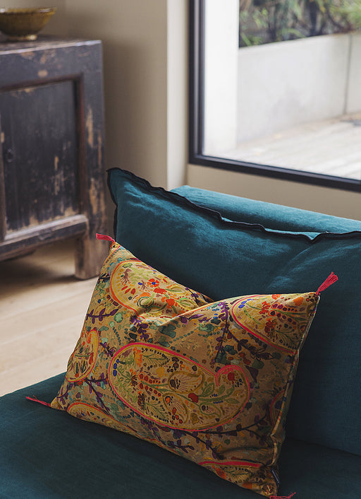 Housse de coussin Inika et pompons