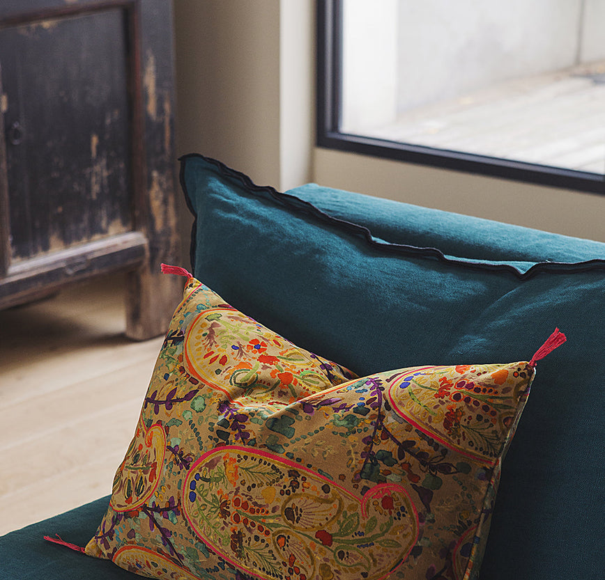 Housse de coussin Inika et pompons