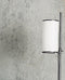 Luminaire : abat-jour cylindrique blanc avec des contours noirs