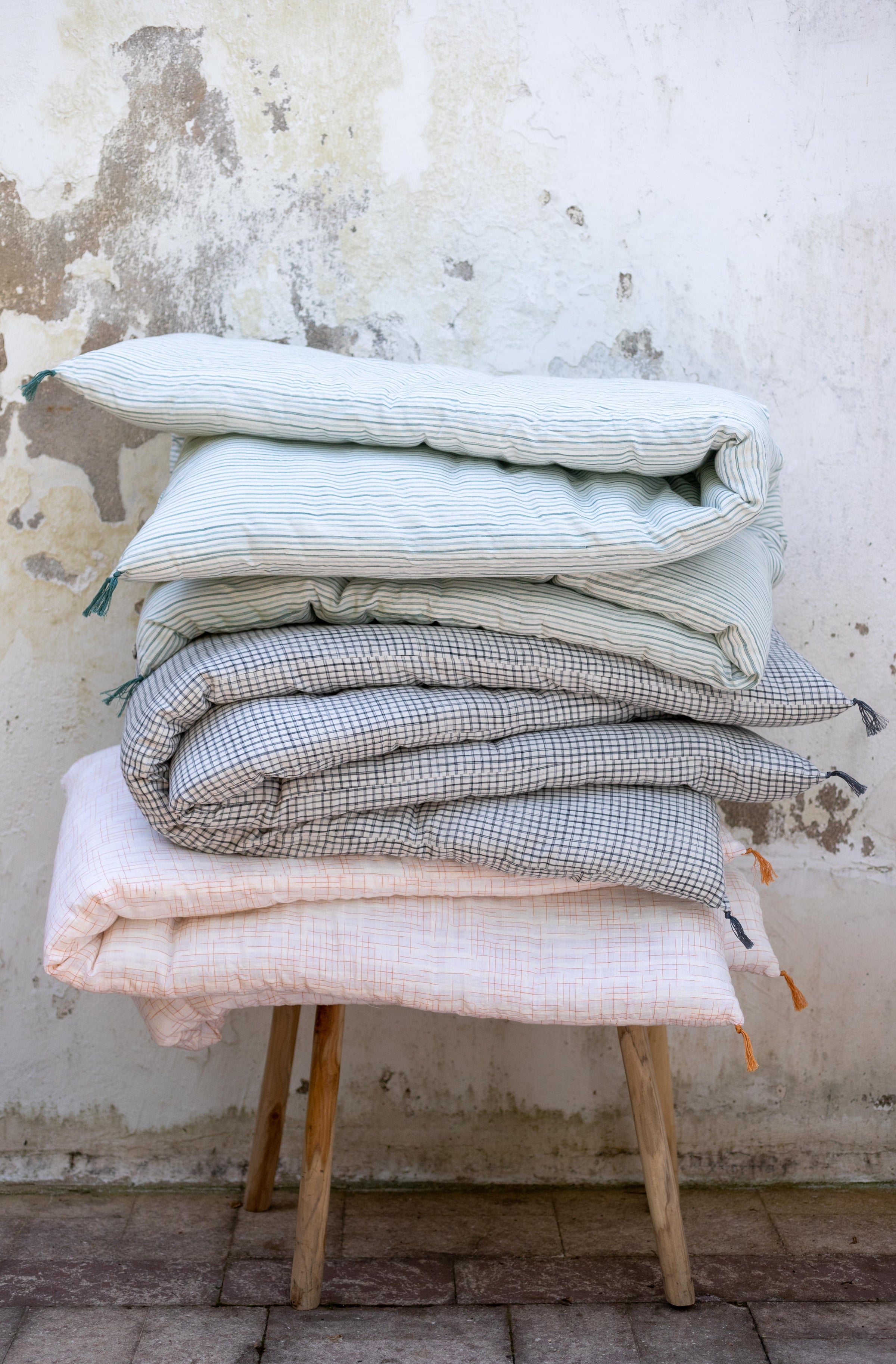 Matelas à mettre en bout de lit à carreaux ou rayés