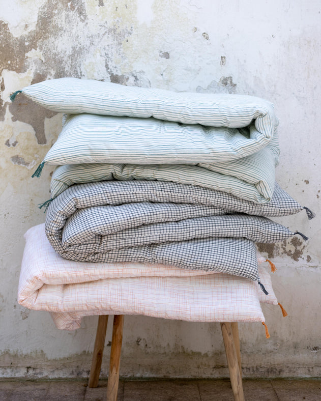 Matelas à mettre en bout de lit à carreaux ou rayés