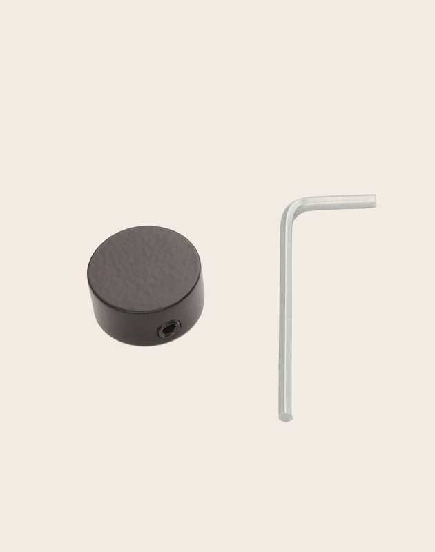 Accessoires embouts noirs pour poser votre tringle à rideaux