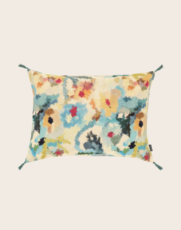Housse de coussin imprimée Fiore pour canapé en lin et jute avec ses pompons signature