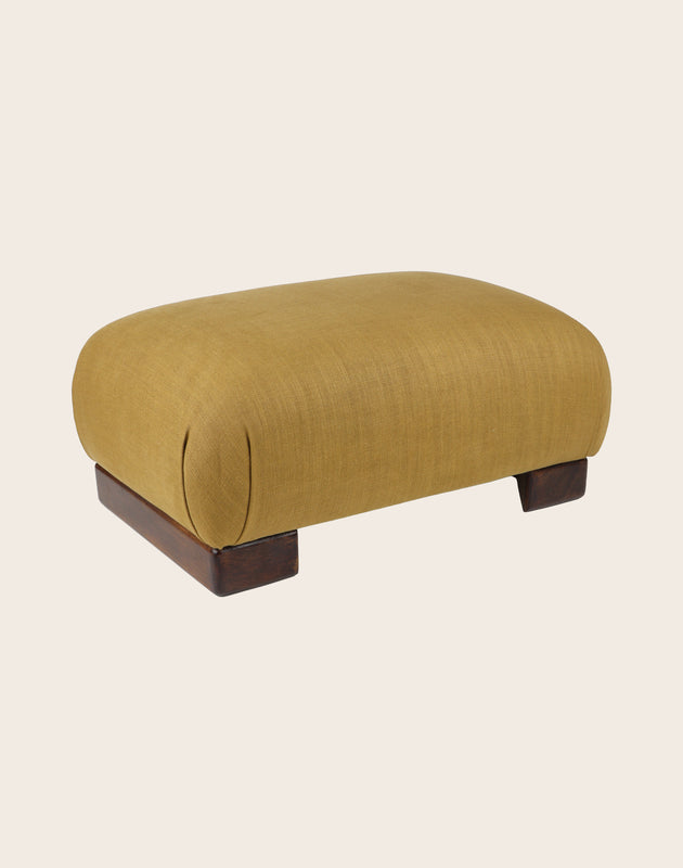 Packshot du repose-pieds Pacha en bois de hêtre massif et tissu en lin Gareth 