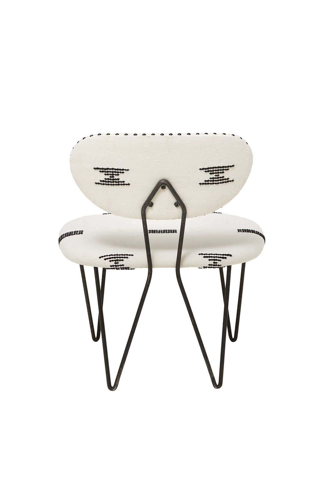 Dos du fauteuil trombone de chez Caravane
