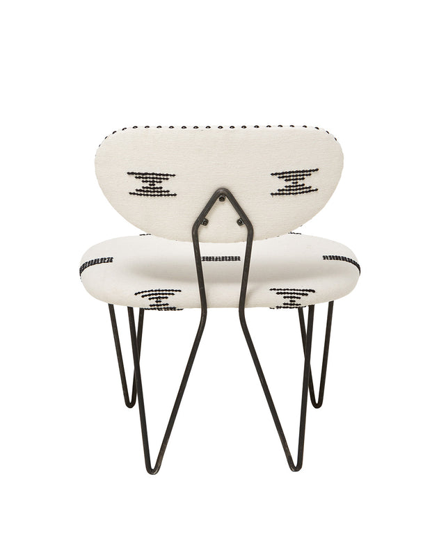 Dos du fauteuil trombone de chez Caravane