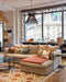 Tapis Lohdi en laine avec les tables basses Atoll en acier