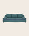 Grand divan dans les tons bleus avec coussins