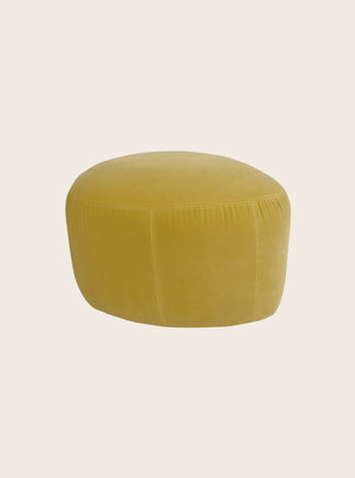 Petit pouf rond en tissu pour un salon Caillou
