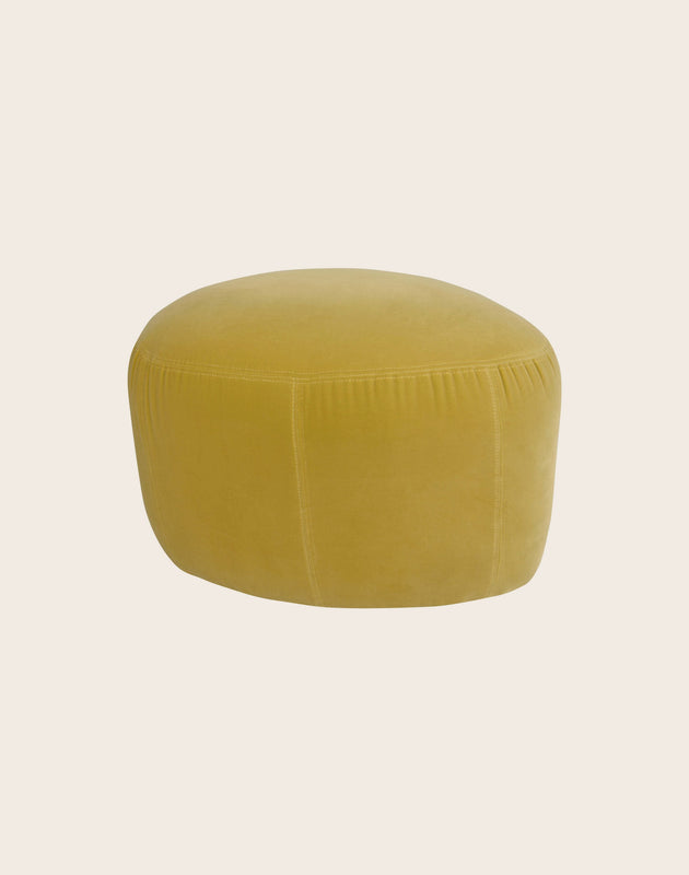 Petit pouf rond en tissu pour un salon Caillou