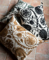 Trois housses de coussin en coton brodé Anor couleur Cannelle, Cypres et Reglisse