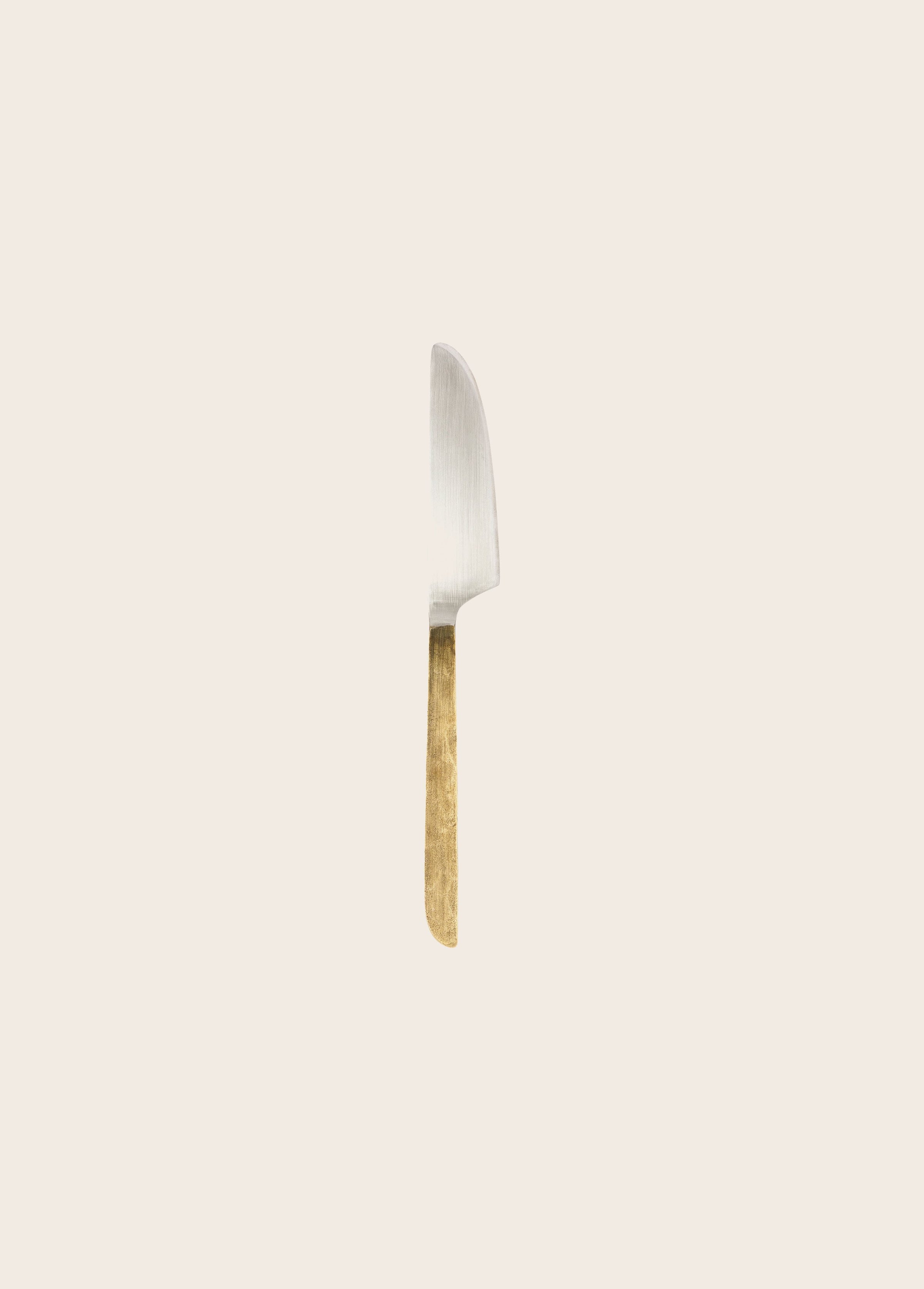 Couteau en acier avec manche doré