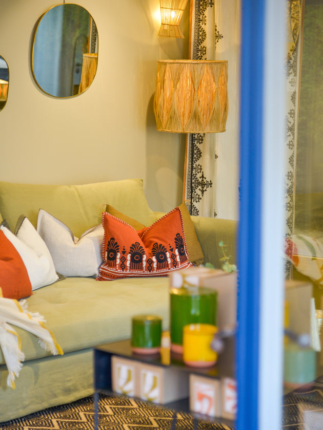 Housse de coussin terracotta et noir pour canapé en coton