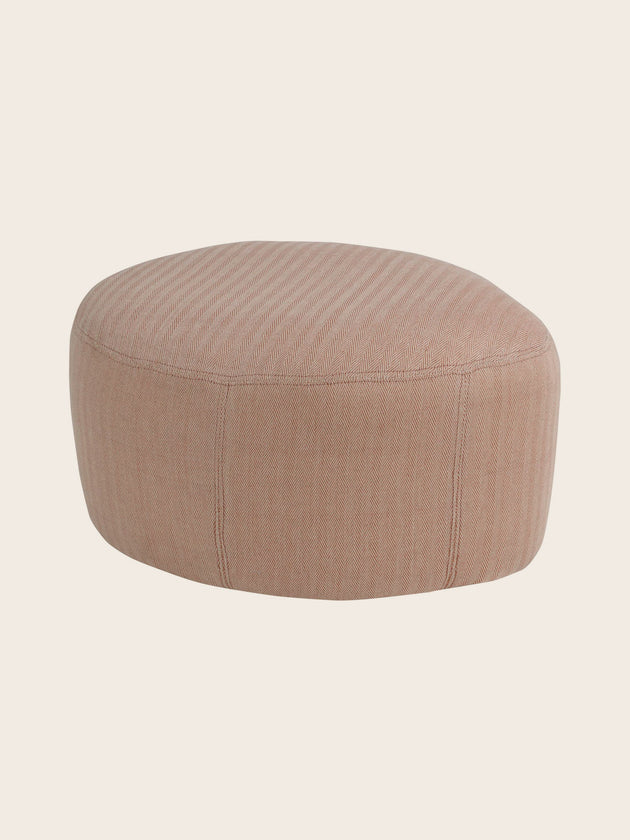 Petit pouf rond pour salon en tissu