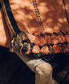 Plaid Kisama en teinte orangeade